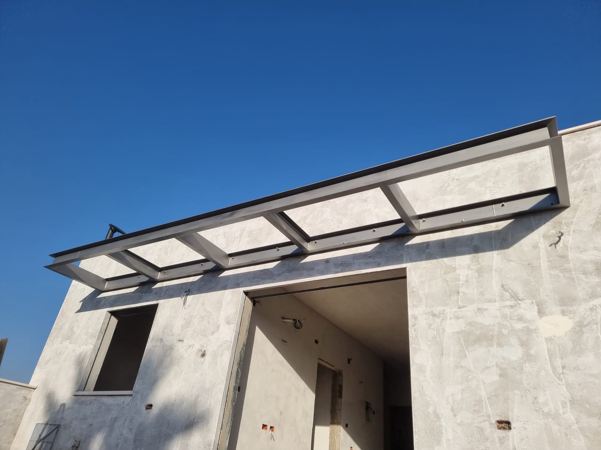 פרגולה או גג – עבודת מסגרות